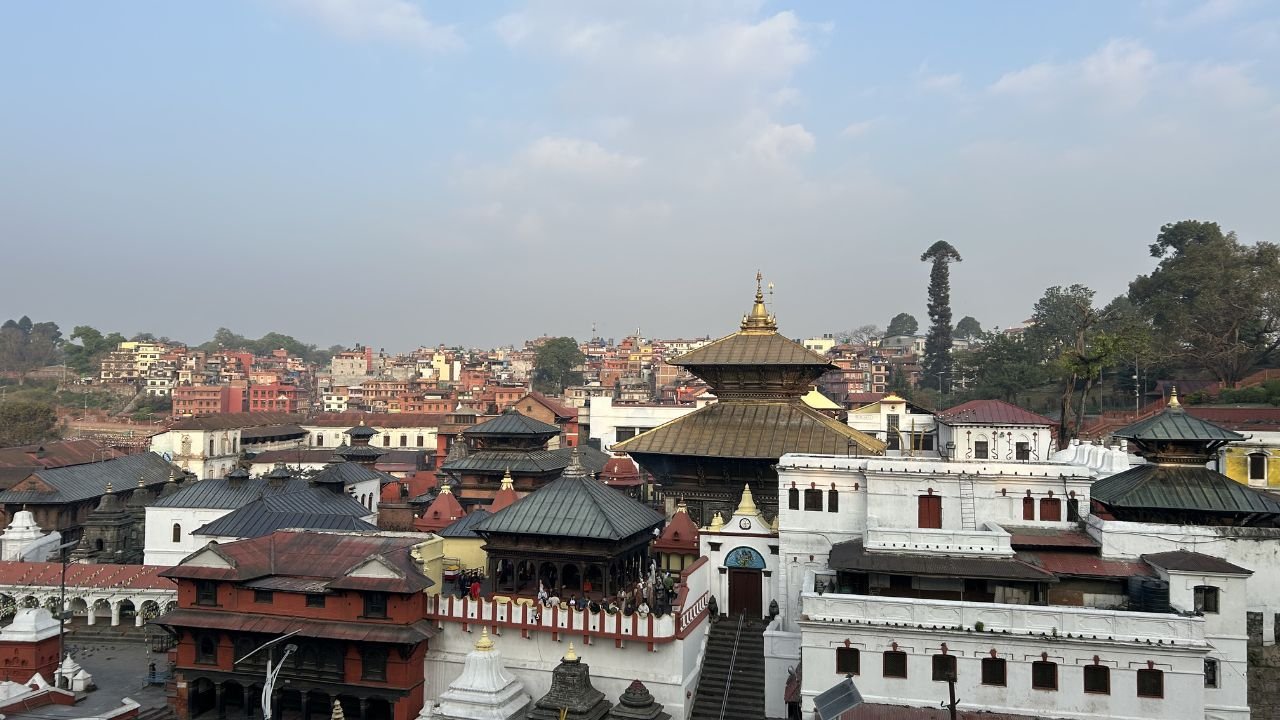 Golden pagoda roof of Pashupatinath with riverside rituals